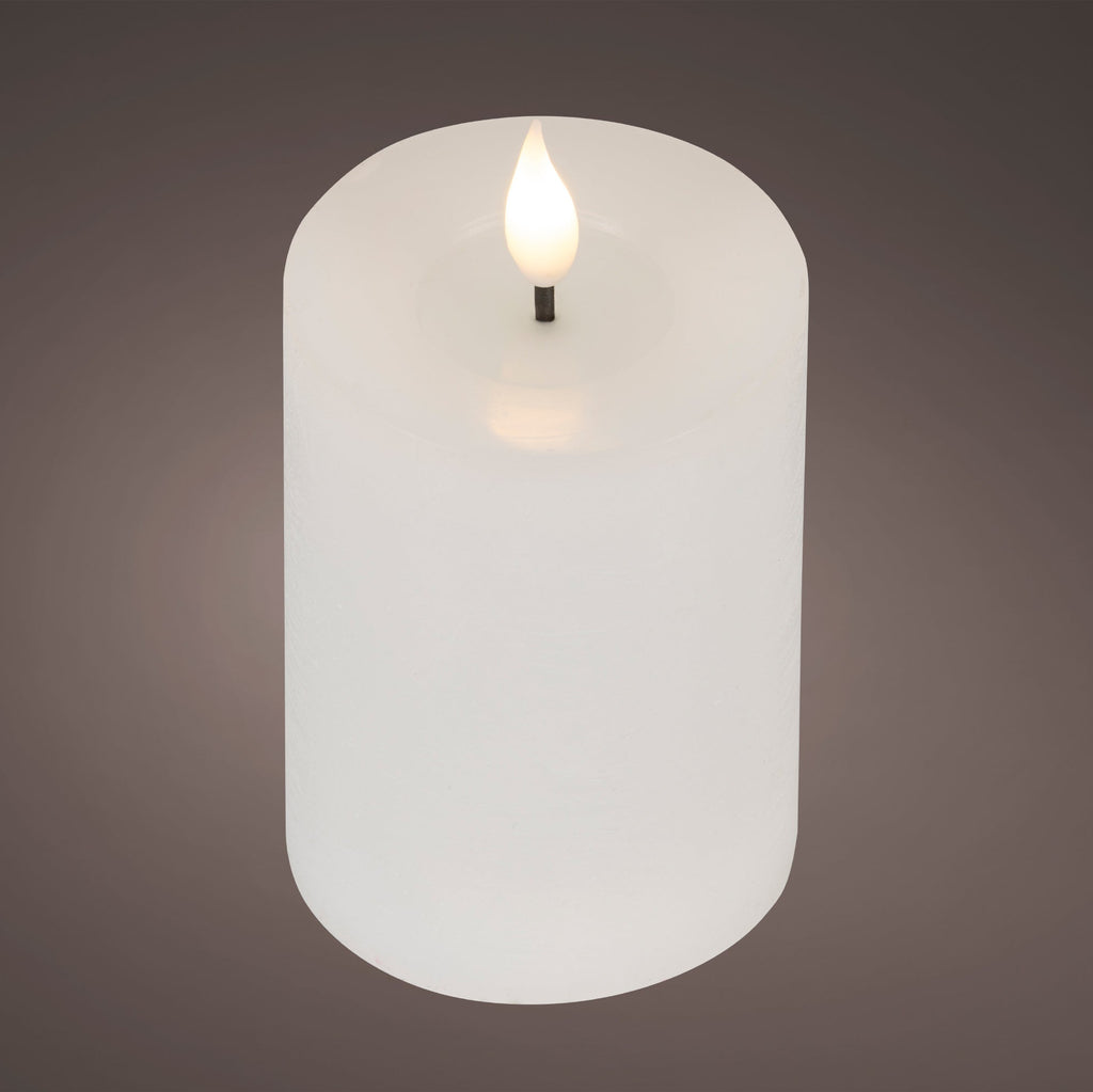 Tall white Lumineo LED candle with a realistic warm-white resin wick flame and rustic wax finish