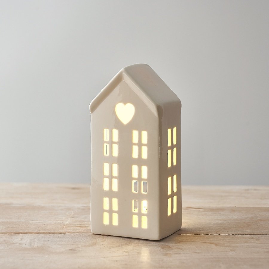 Dainty white ceramic LED house with heart cut-out and glowing windows, 16cm