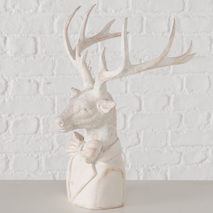 Side view of the hand-painted matte white Sigmund deer bust showing its detailed antlers and bow tie