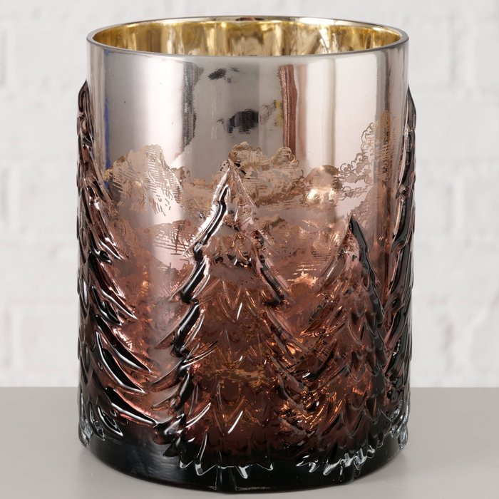 Tanny brown lacquered glass windlight with embossed Christmas tree relief and gold interior on a neutral background